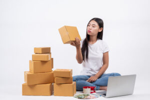 Women who are thinking about the white background, business operators, online shopping, independent work concepts.